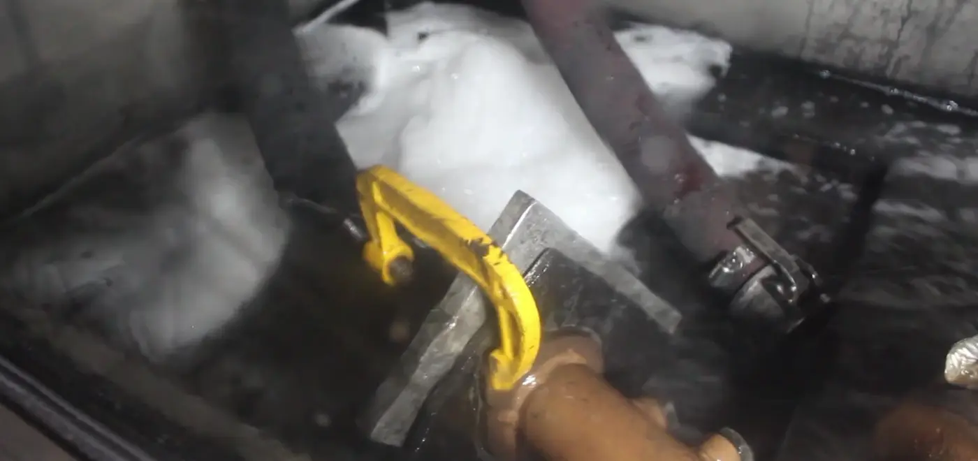 A filter undergoing the cleaning cycle inside the machine