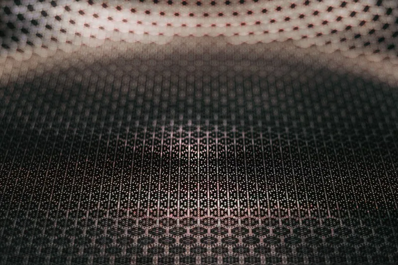 Macro view of a diesel particulate filter substrate, showing the honeycomb channel structure that traps soot